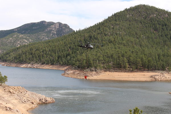 2019-04-09 Helicopter with water bucket at Button Rock Preserve