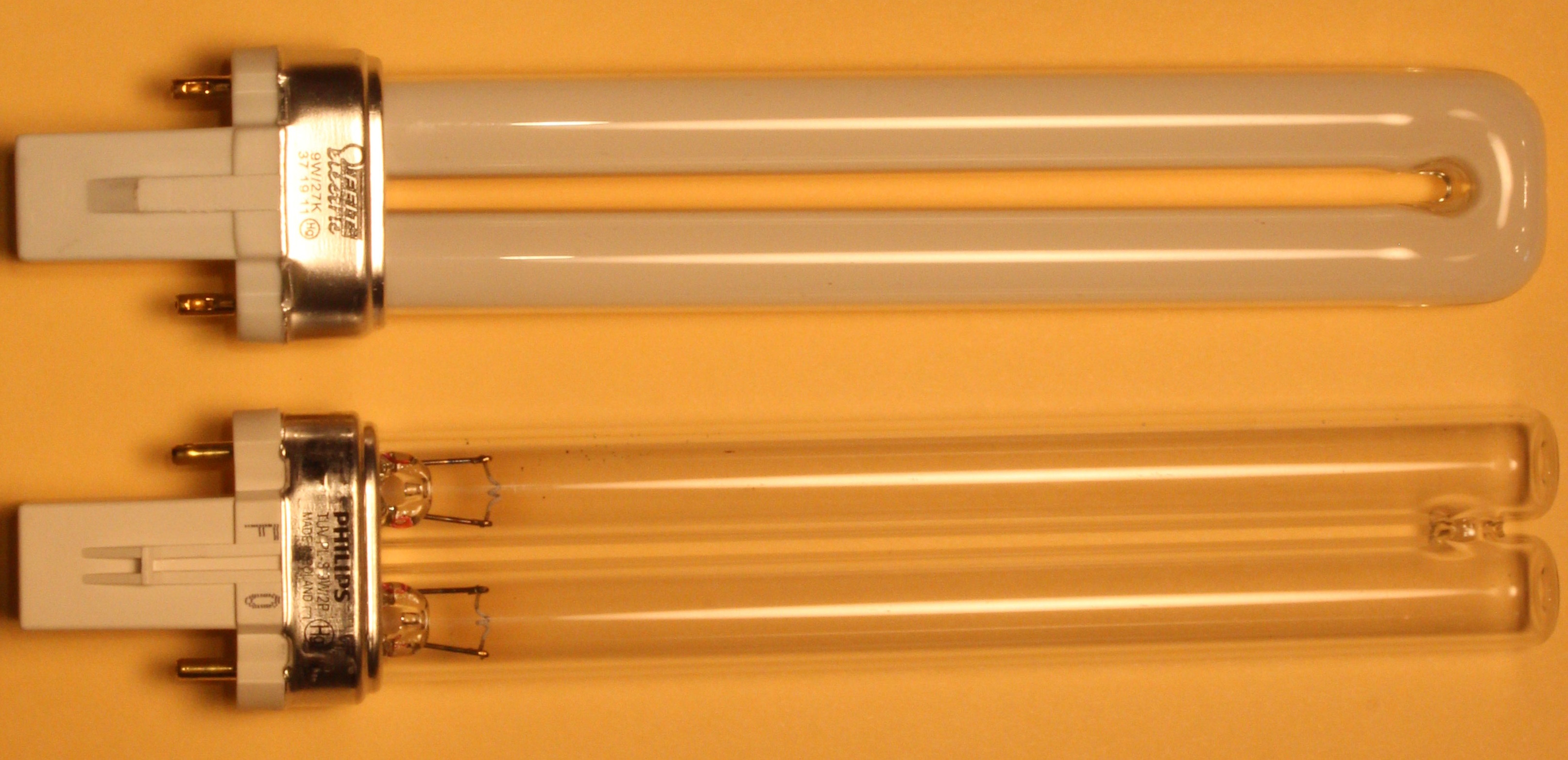 Regular fluorescent lamp (top) and a germicidal UVC lamp (bottom)